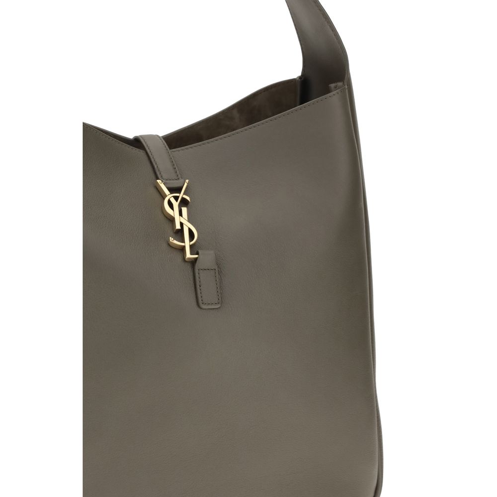 Shoulder Flap Bag by Saint Laurent for women in bos taurus calf grained & suede leather bicolour showcases a enviable silhouette, artfully detailed with a secure flap, zipper & hook, organized single-compartment, and versatile shoulder-strap, handle & adjustable-strap for a enviable look.