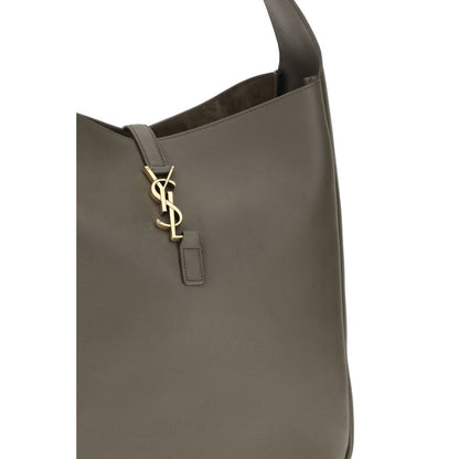 Shoulder Flap Bag by Saint Laurent for women in bos taurus calf grained & suede leather bicolour showcases a enviable silhouette, artfully detailed with a secure flap, zipper & hook, organized single-compartment, and versatile shoulder-strap, handle & adjustable-strap for a enviable look.