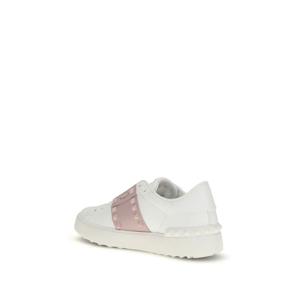 Sneakers by Valentino Garavani for women in bos taurus calfskin leather white presents a impeccable silhouette as Rockstud Women's Low Top Bos Taurus Calfskin Leather Sneakers, expertly defined by a impeccable low-top style for a impeccable, high-fashion look.