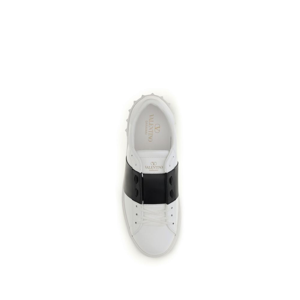 Sneakers by Valentino Garavani for men in bos taurus calf leather blue presents a sumptuous silhouette, artfully capturing the essence of the Men's Low Top Slip On Bos Taurus Calf Leather Sneakers with its sumptuous low-top slip-on style design.