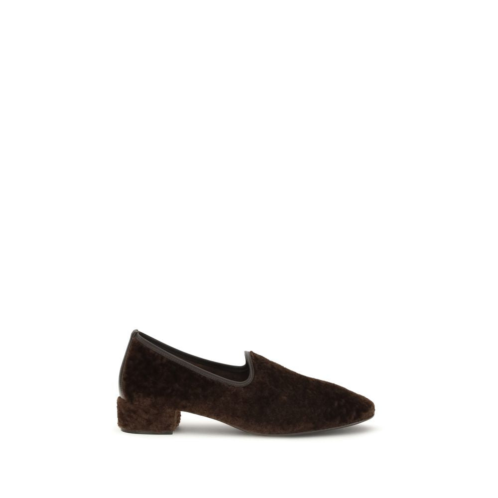This Flat Loafer Slip-On Shoes by Herbert Levine for women in bos taurus calf suede leather brown features an exquisite silhouette from the Women's Bos Taurus Calf Suede Leather Flat Loafer Slip-On Shoes collection, defined by a sophisticated flat and elegant square toe style.