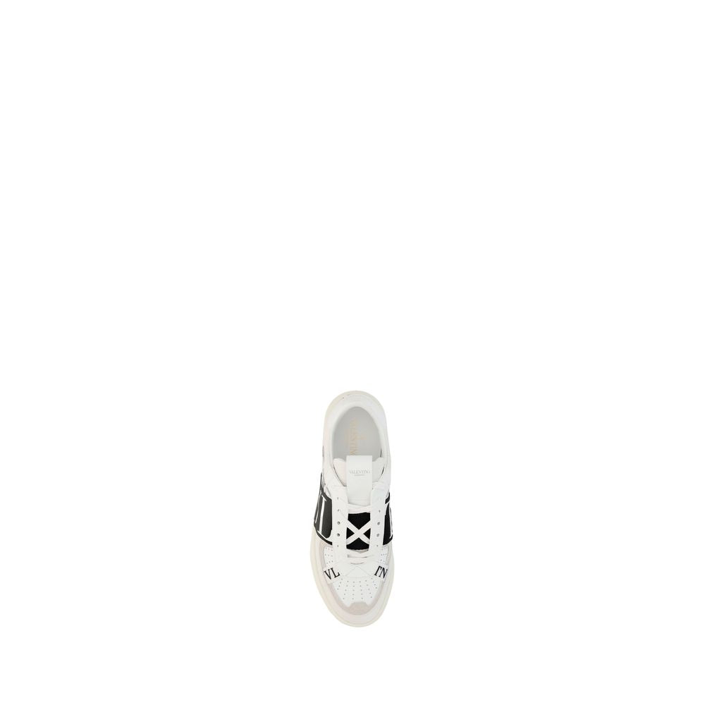 Athletic Sneakers by Valentino Garavani for men in bos taurus calfskin leather white features an effortless chic silhouette, showcasing the signature low-top style of the Men's Low Top Bos Taurus Calfskin Leather Athletic Sneakers collection with a truly effortless chic finish.