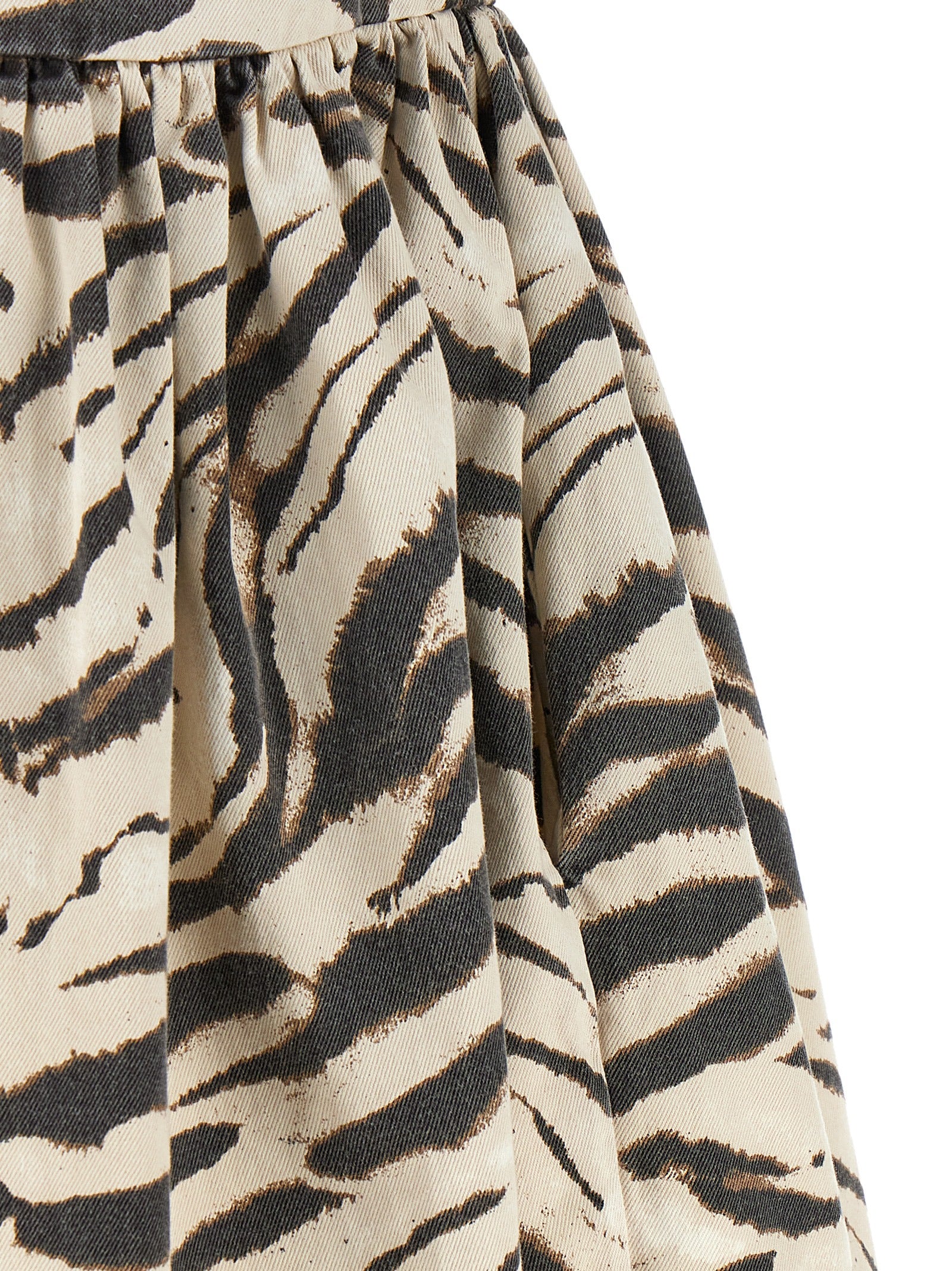 Dress by Ganni for women in organic cotton denim multicolor, zebra & print features an sultry silhouette defined by a and , falling to an sultry short mini for a sultry look.