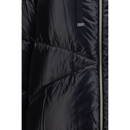 Puffer Jacket by Herno for women in polyamide & fur black features a dramatic silhouette, showcasing a sophisticated hooded high-collar neckline and distinctive lightweight, hooded & insulated for a dramatic aesthetic.