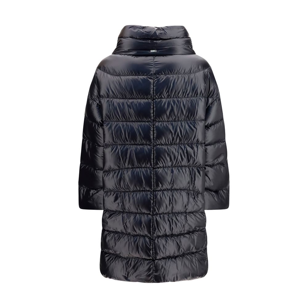 Puffer Jacket by Herno for women in polyester black & patterned features a dramatic silhouette, showcasing a sophisticated high-collar neckline and distinctive pockets & insulated for a dramatic aesthetic.