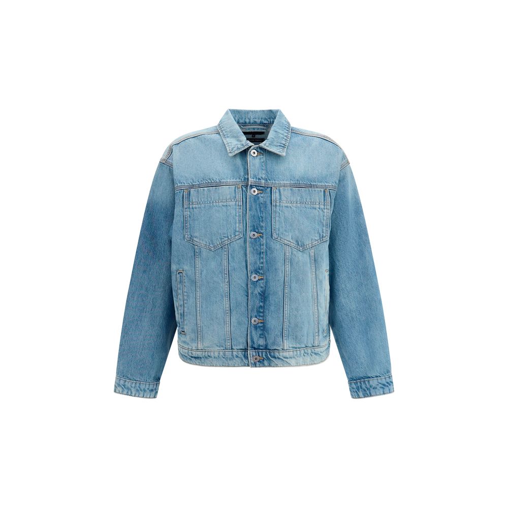Trucker Jacket by 7FOR for men in denim cotton blue features a dramatic silhouette, showcasing a sophisticated and distinctive pockets for a dramatic aesthetic.