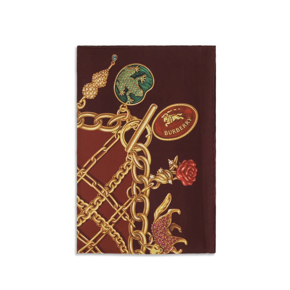 Scarf by Burberry for women in silk bordeaux & print showcases a warm silhouette from the Silk Scarf collection, offering a warm drape that exudes sophisticated luxury.