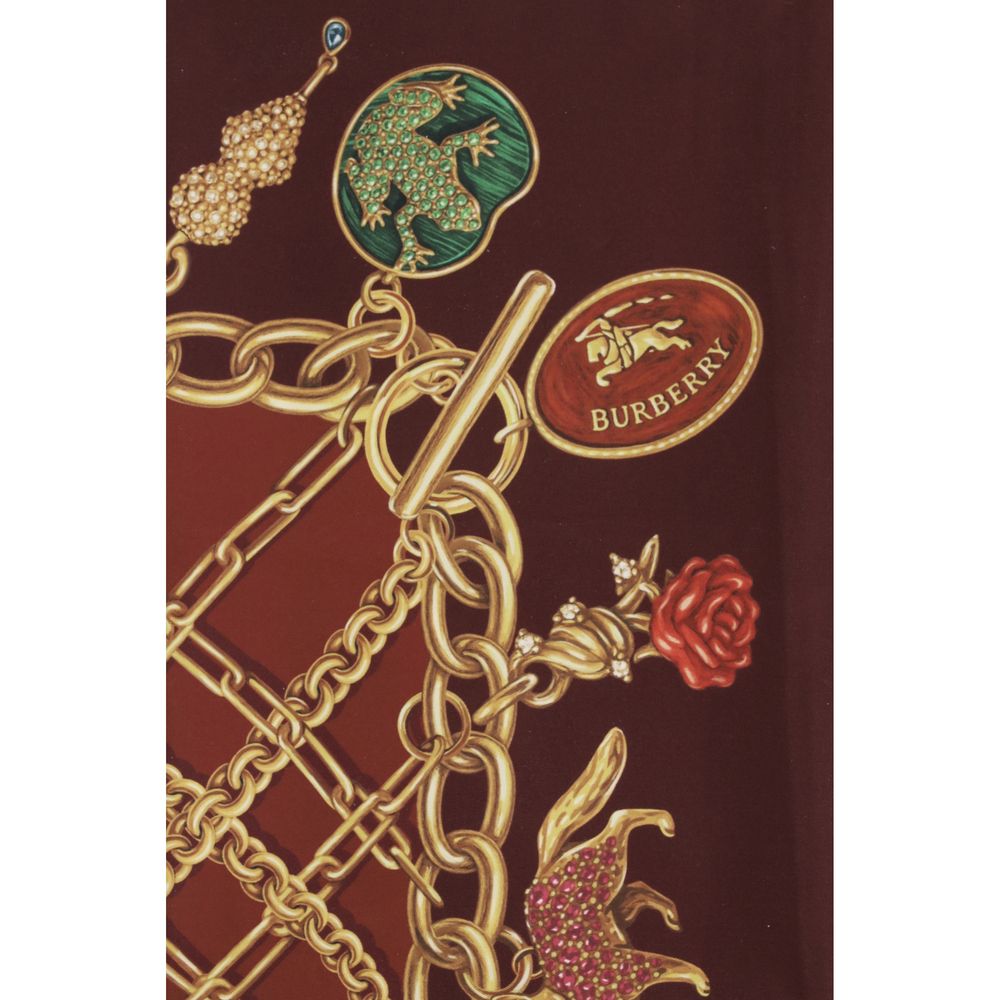 Scarf by Burberry for women in silk bordeaux & print showcases a on trend silhouette, artfully capturing the on trend essence of the Silk Scarf design with a sophisticated finish.