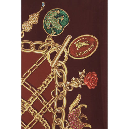 Scarf by Burberry for women in silk bordeaux & print showcases a on trend silhouette, artfully capturing the on trend essence of the Silk Scarf design with a sophisticated finish.