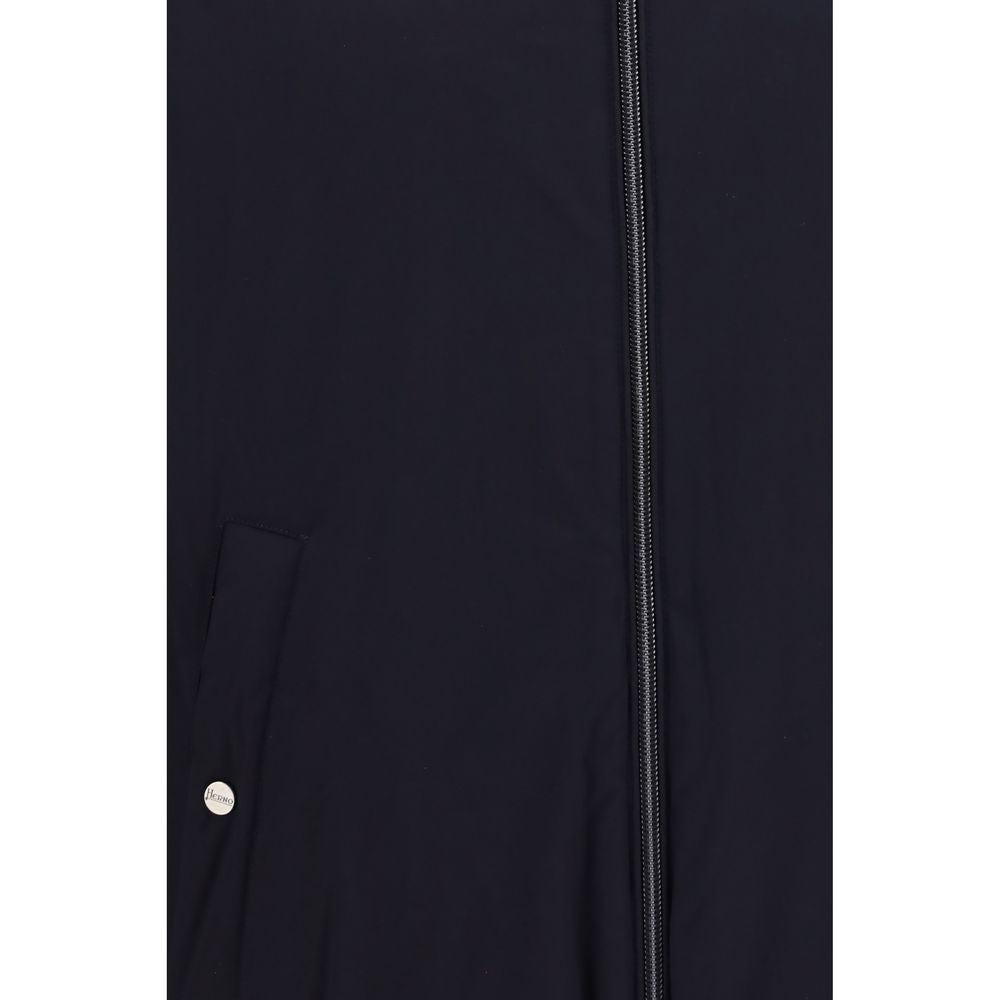 Hooded Overcoat by Herno for men in polyamide & goose-down blue showcases a enveloping silhouette, detailed with distinctive pockets, hooded & insulated and a enveloping hooded neckline.