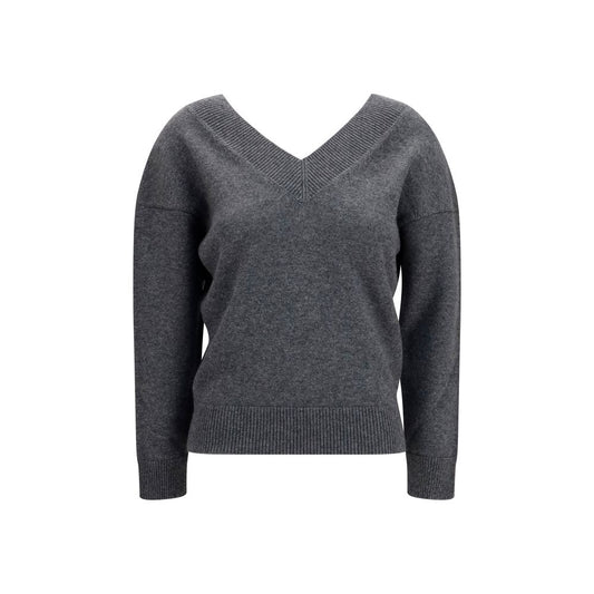 Sweater by Tom Ford for women in cashmere & capra leather gray showcases a sumptuous silhouette, artfully finished with a sumptuous v-neck neckline and long-sleeve for a sophisticated, sumptuous look.