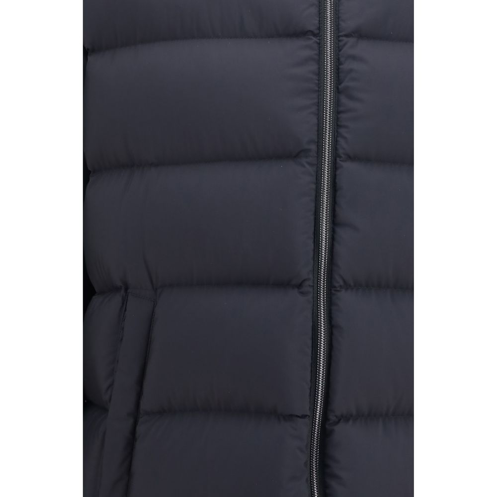 Overcoat by Herno for men in polyamide black features a cosy chic silhouette, artfully detailed with a sophisticated and premium windproof, pockets & insulated for a cosy chic finish.