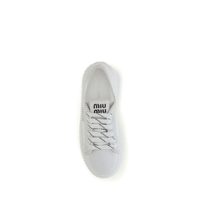 Sneakers by Miu Miu for women in polyamide & mesh white presents a impeccable silhouette as Women's Fashion Polyamide & Mesh Sneakers, expertly defined by a impeccable fashion style for a impeccable, high-fashion look.