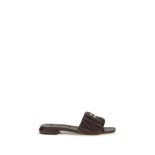 Flat Sandals by Miu Miu for women in bos taurus calf nappa leather brown features an statuesque Women's Bos Taurus Calf Nappa Leather Flat Sandals silhouette with a refined flat and elegant .
