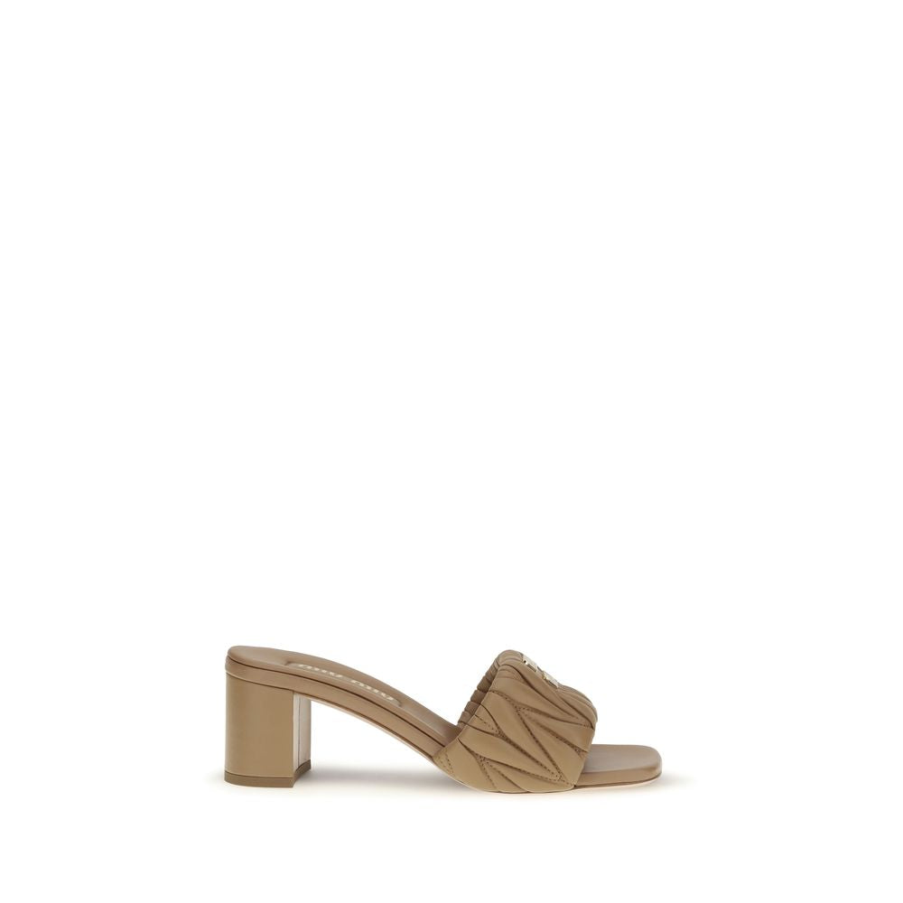 Platform Geometric Sandals by Miu Miu for women in bos taurus calf & lambskin leather beige & monogram presents a sculptural silhouette, showcasing the Women's Bos Taurus Calf & Lambskin Leather Platform Geometric Sandals design with a sculptural platform geometric-heel and for a premium look.