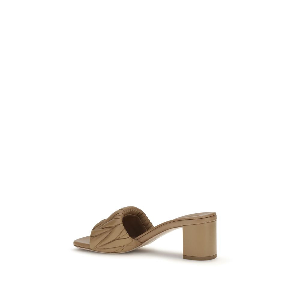 Platform Geometric Sandals by Miu Miu for women in bos taurus calf & lambskin leather and beige & monogram presents a captivating silhouette, showcasing the signature style of the Women's Bos Taurus Calf & Lambskin Leather Platform Geometric Sandals with a captivating platform geometric-heel and captivating .