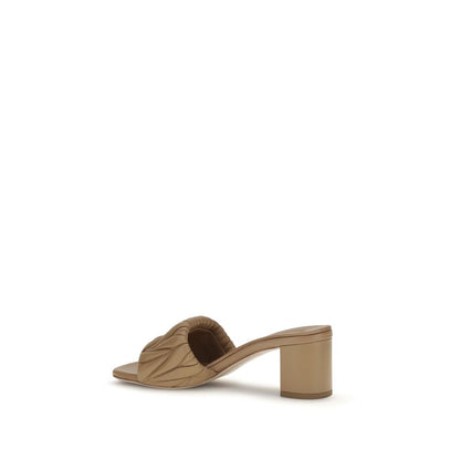 Platform Geometric Sandals by Miu Miu for women in bos taurus calf & lambskin leather and beige & monogram presents a captivating silhouette, showcasing the signature style of the Women's Bos Taurus Calf & Lambskin Leather Platform Geometric Sandals with a captivating platform geometric-heel and captivating .