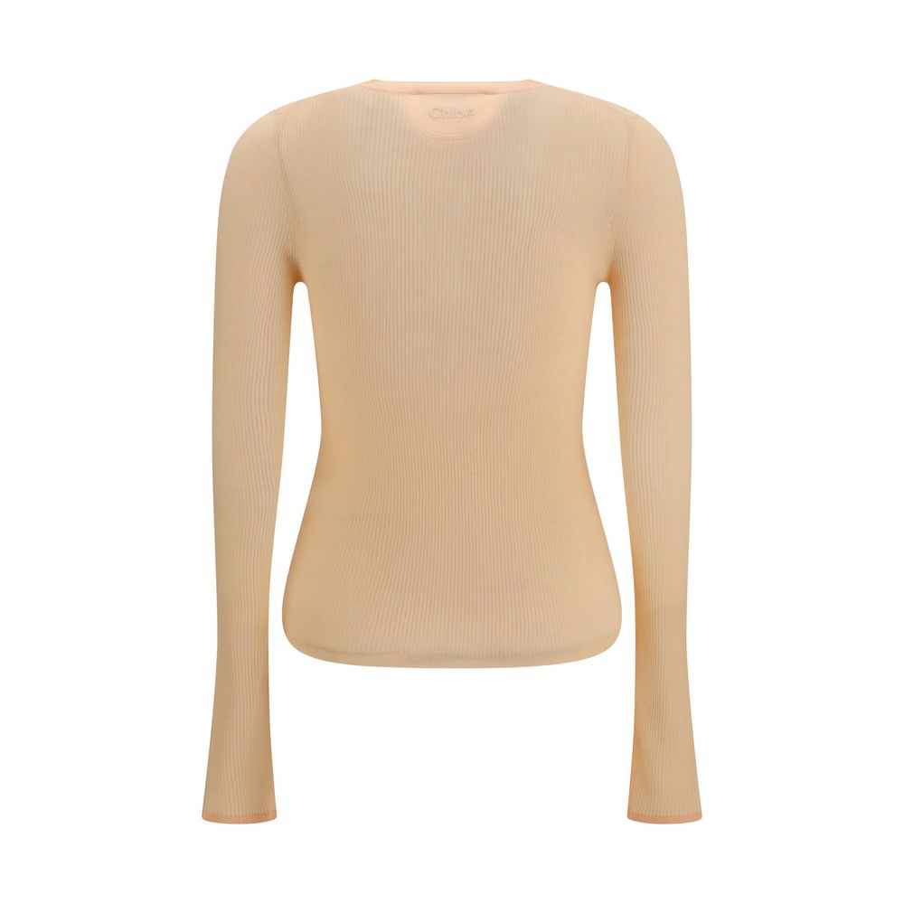 Sweatshirt by Chloé for women in wool orange features an exquisite silhouette, showcasing and crew neckline details for a exquisite look.