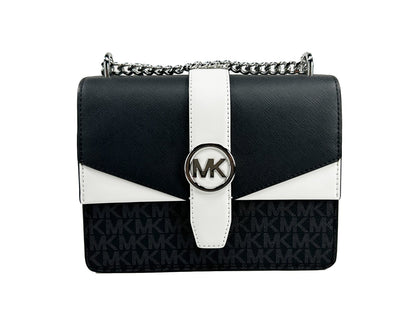 Small Crossbody Flap Handbag by Michael Kors for women in polyurethane silver & white features an multi-faceted design with a secure flap & magnetic, ample , and versatile crossbody-strap for a multi-faceted finish.