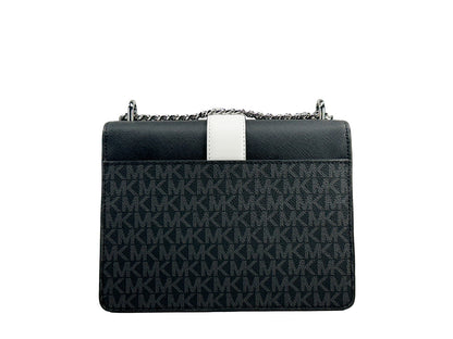 Small Crossbody Flap Handbag by Michael Kors for women in polyurethane silver & white features a transformative elegance silhouette, showcasing a secure flap & magnetic, organized , and versatile crossbody-strap for a transformative elegance look.