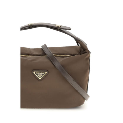 This Mini Handbag by Prada for women in polyamide polyester nylon leather & viscose and brown presents a sculptural silhouette featuring a secure , ample , and versatile shoulder-strap, adjustable-strap & handle for a sculptural finish.