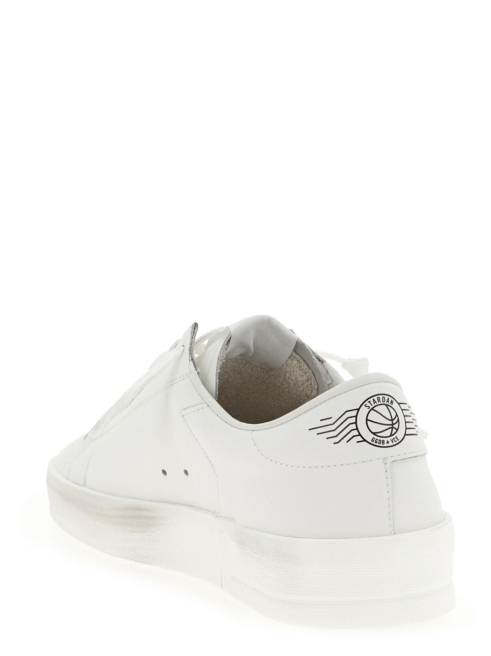 Sneakers by Golden Goose for men in cowhide leather gold, white & print presents a sumptuous silhouette, artfully capturing the essence of the Men's Low Top Cowhide Leather Sneakers with its sumptuous low-top style design.