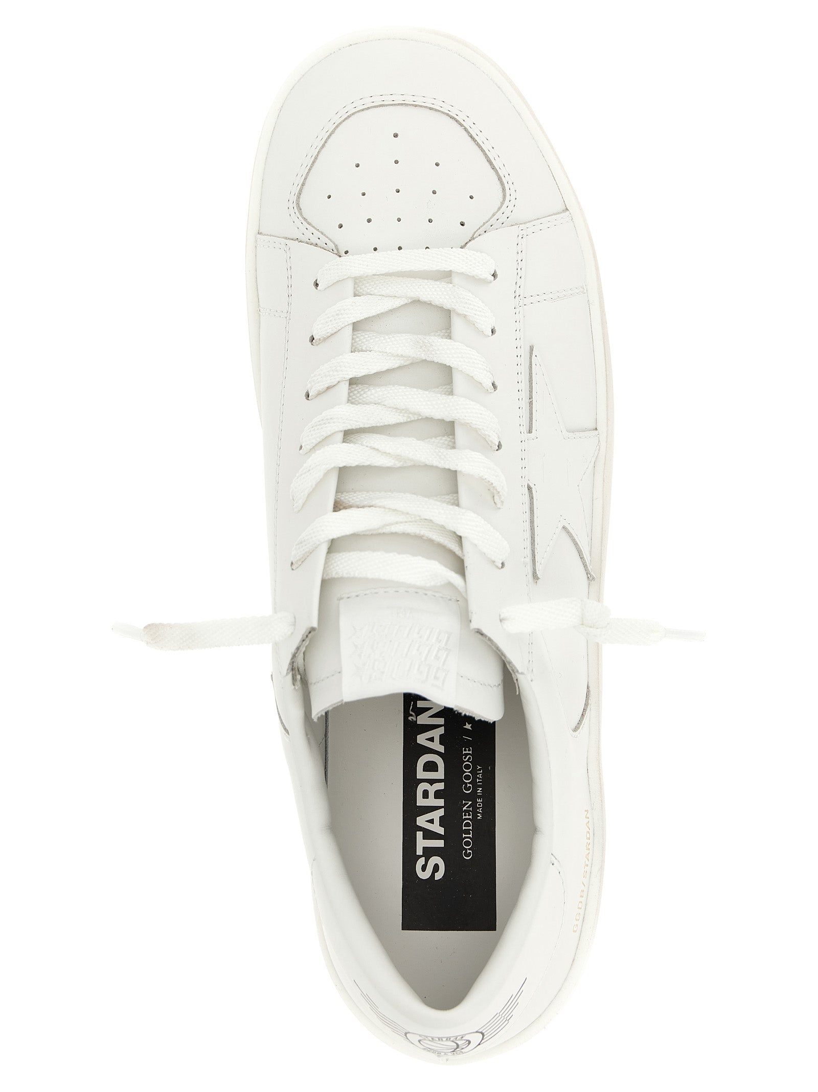 Sneakers by Golden Goose for men in cowhide leather gold, white & print presents a impeccable silhouette as Men's Low Top Cowhide Leather Sneakers, expertly defined by a impeccable low-top style for a impeccable, high-fashion look.