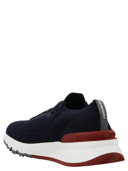 Athletic Sneakers by Brunello Cucinelli for men in poly cotton calfskin & wool blue showcases a architectural silhouette, artfully capturing the essence of the Men's Slip On Poly Cotton Calfskin & Wool Athletic Sneakers with its signature architectural slip-on style construction.