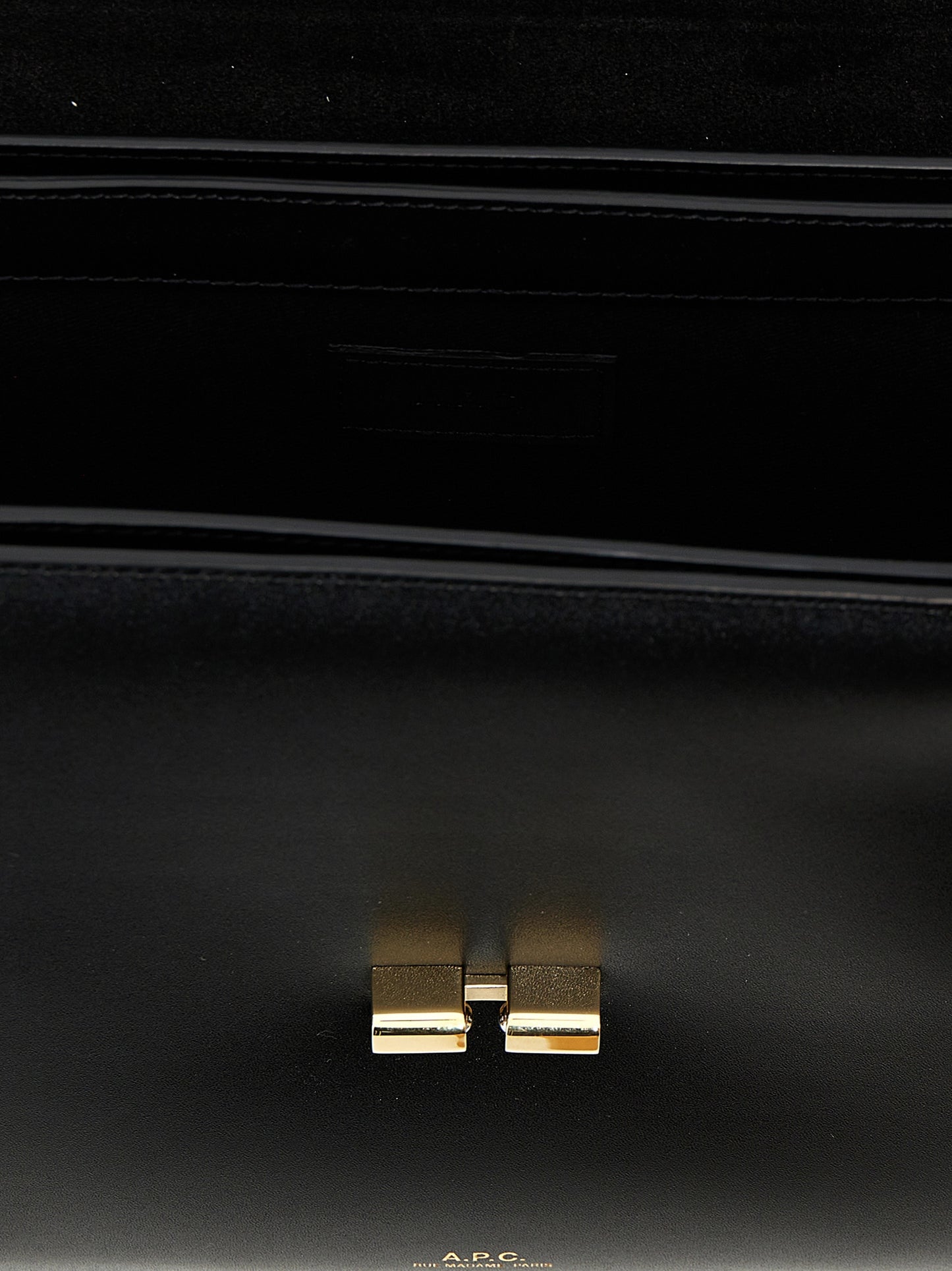 Large Crossbody Flap Handbag by A.P.C. for women in cowhide leather black & gold features a multifaceted silhouette, showcasing a secure flap & clasp and multifaceted with versatile crossbody-strap, shoulder-strap & adjustable-strap for multifaceted style.