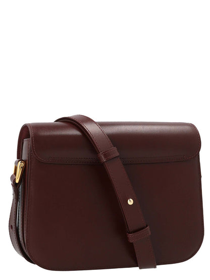 Small 2-in-1 Shoulder & Crossbody Handbag by A.P.C. for women in cowhide leather bordeaux features an multi-faceted design with a secure snap, ample , and versatile crossbody-strap, shoulder-strap & adjustable-strap for a multi-faceted finish.