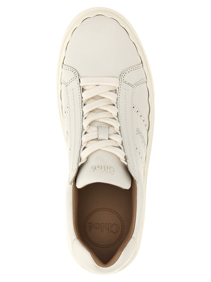 Sneakers by Chloé for women in leather & rubber white presents a on trend silhouette from the Women's Low Top Leather & Rubber Sneakers collection, showcasing a on trend low-top style for an elevated aesthetic.