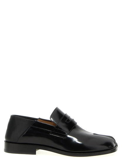 Loafer Slip-On Shoes by Maison Margiela for men in calfskin leather black & signature features an ergonomic silhouette, perfectly showcasing Men's Calfskin Leather Loafer Slip-On Shoes with its distinct and elegant .