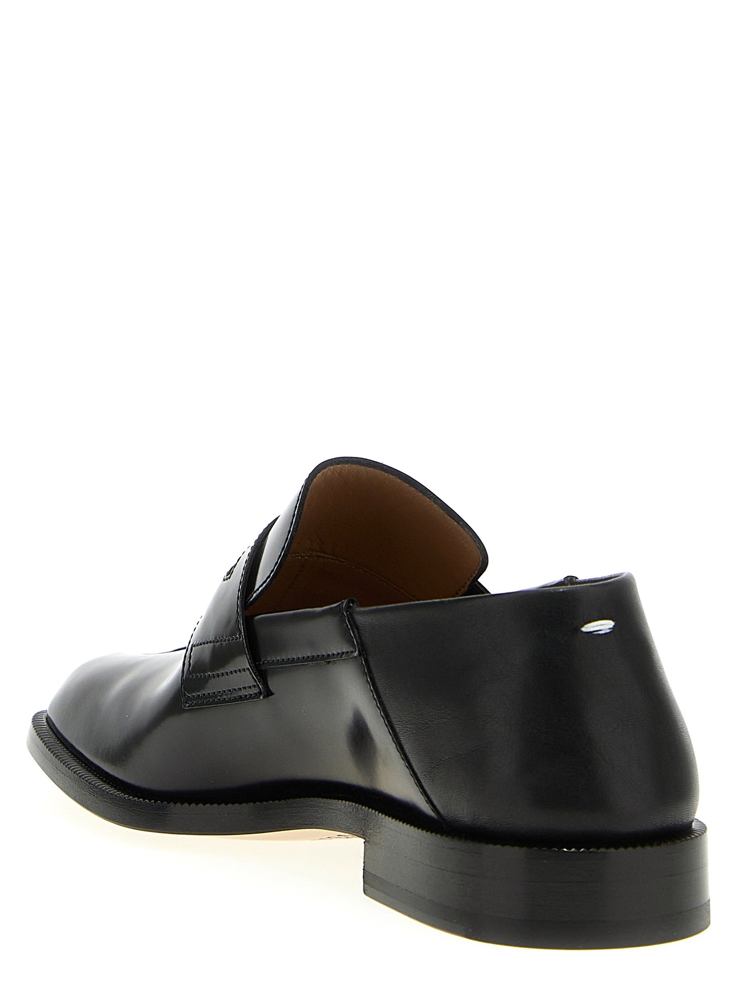 Loafer Slip-On Shoes by Maison Margiela for men in calfskin leather black & signature showcases a resplendent Men's Calfskin Leather Loafer Slip-On Shoes aesthetic, defined by its resplendent and elegant .
