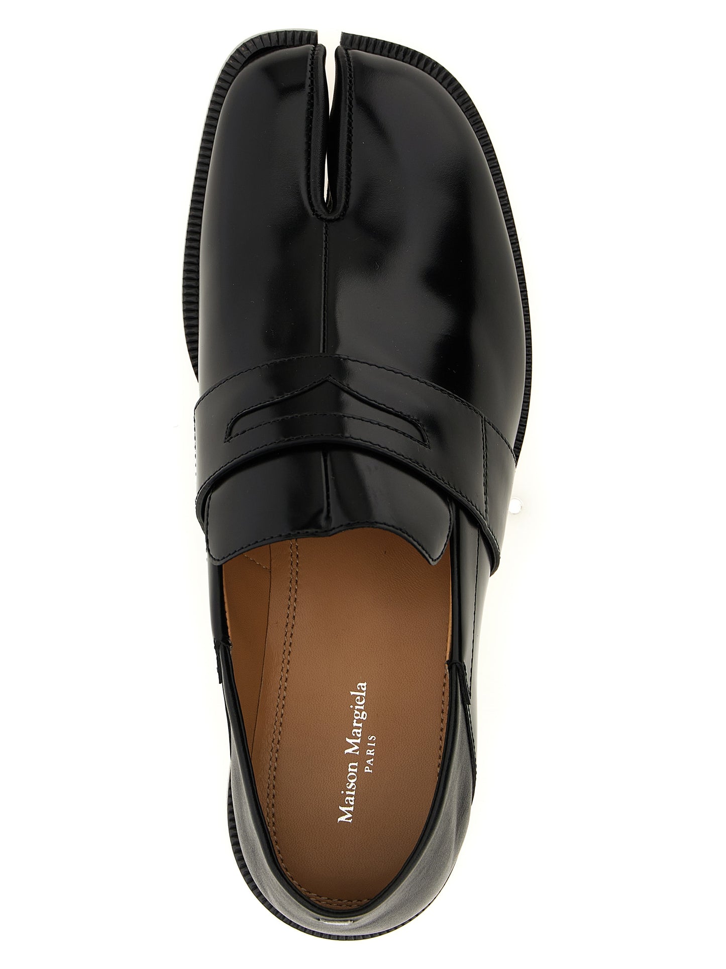 Flat Loafer Slip-On Sock Shoes by Maison Margiela for women in calfskin leather black features an ergonomic silhouette, perfectly showcasing Japanese Women's Calfskin Leather Flat Loafer Slip-On Sock Shoes with its distinct flat and elegant .