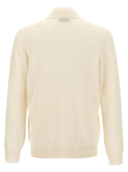 Cardigan by Brunello Cucinelli for men in cashmere white showcases a captivating silhouette, artfully detailed with a captivating and high-neck neckline for a truly sophisticated captivating look.