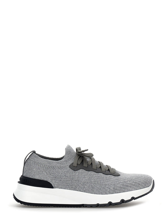Athletic Sneakers by Brunello Cucinelli for men in cotton & calfskin gray showcases an impeccable silhouette, defined by an impeccable slip-on style design that perfectly captures the essence of the Men's Slip On Cotton & Calfskin Athletic Sneakers.