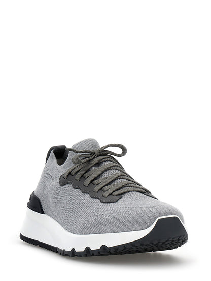 Athletic Sneakers by Brunello Cucinelli for men in cotton & calfskin gray features an exquisite silhouette, showcasing the premium slip-on style of the Men's Slip On Cotton & Calfskin Athletic Sneakers with an exquisite finish.
