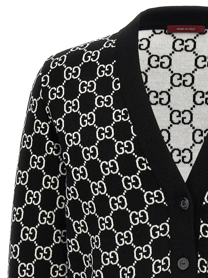 Cardigan by Gucci for women in wool bicolour, black, white & jacquard presents a textural silhouette, artfully finished with a textural v-neck neckline and for a sophisticated, textural look.