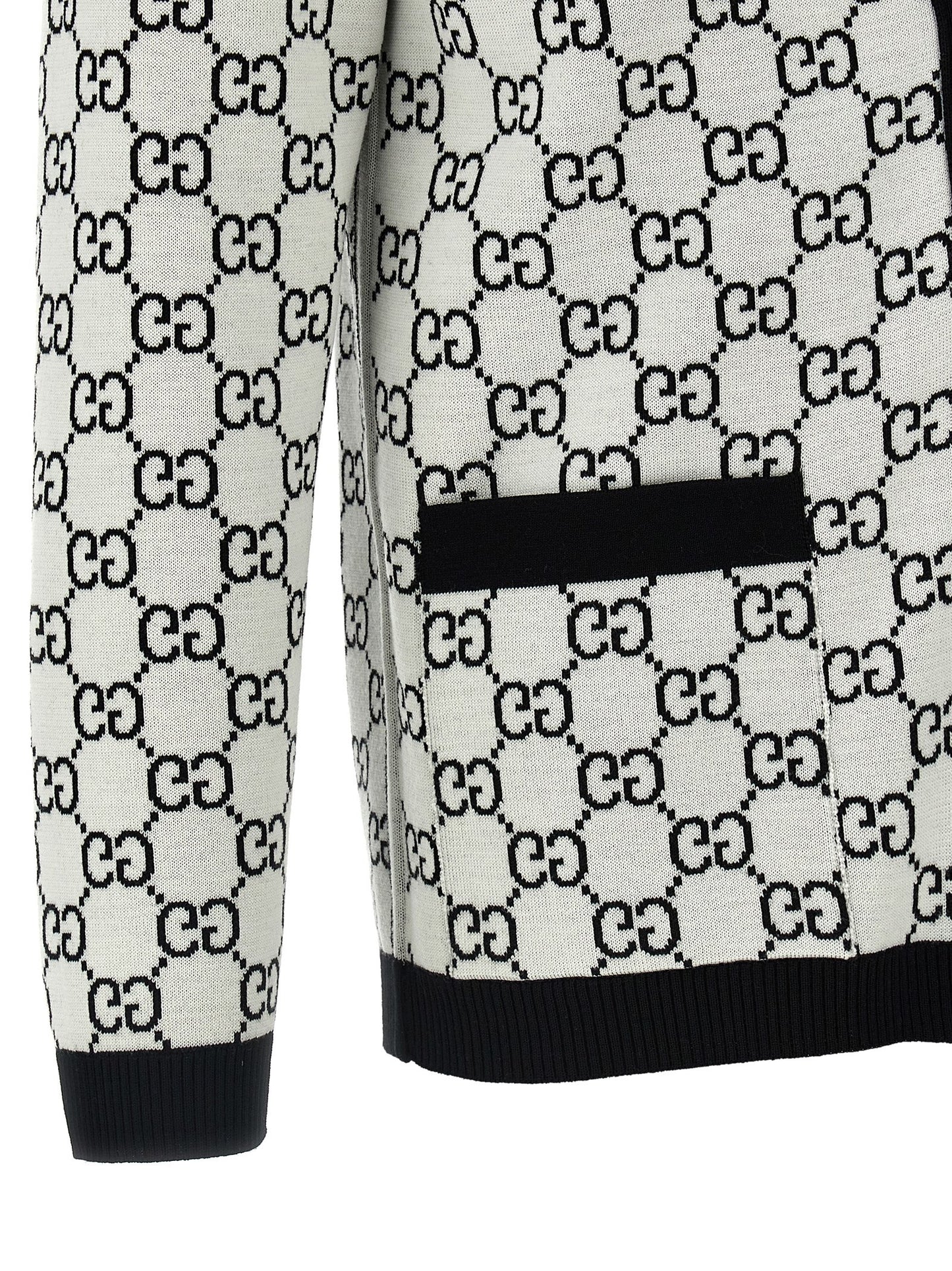Cardigan by Gucci for women in wool bicolour, black, white & jacquard showcases a luxurious silhouette, meticulously detailed with a sophisticated and for a refined finish.