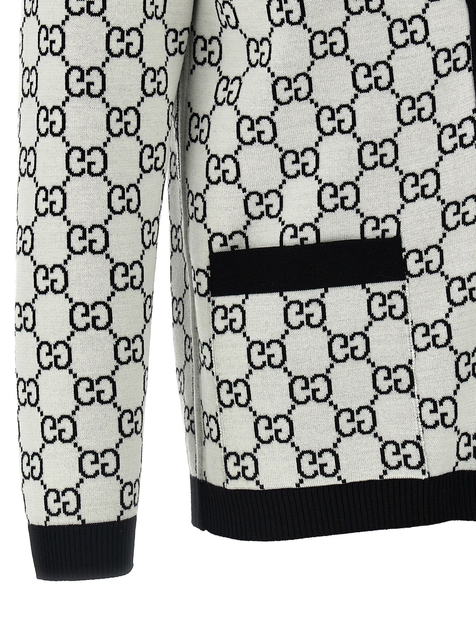 Cardigan by Gucci for women in wool bicolour, black, white & jacquard showcases a luxurious silhouette, meticulously detailed with a sophisticated and for a refined finish.