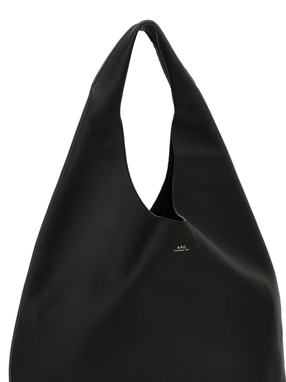 Shoulder Bag by A.P.C. for women in calfskin leather black features an effortlessly chic silhouette with a secure , ample , and versatile shoulder-strap & handle for effortlessly chic everyday luxury.