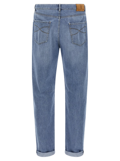 Jeans by Brunello Cucinelli for men in denim cotton & suede leather light-blue features a polished silhouette with a polished straight-leg, reaching a polished long and finished with a polished .