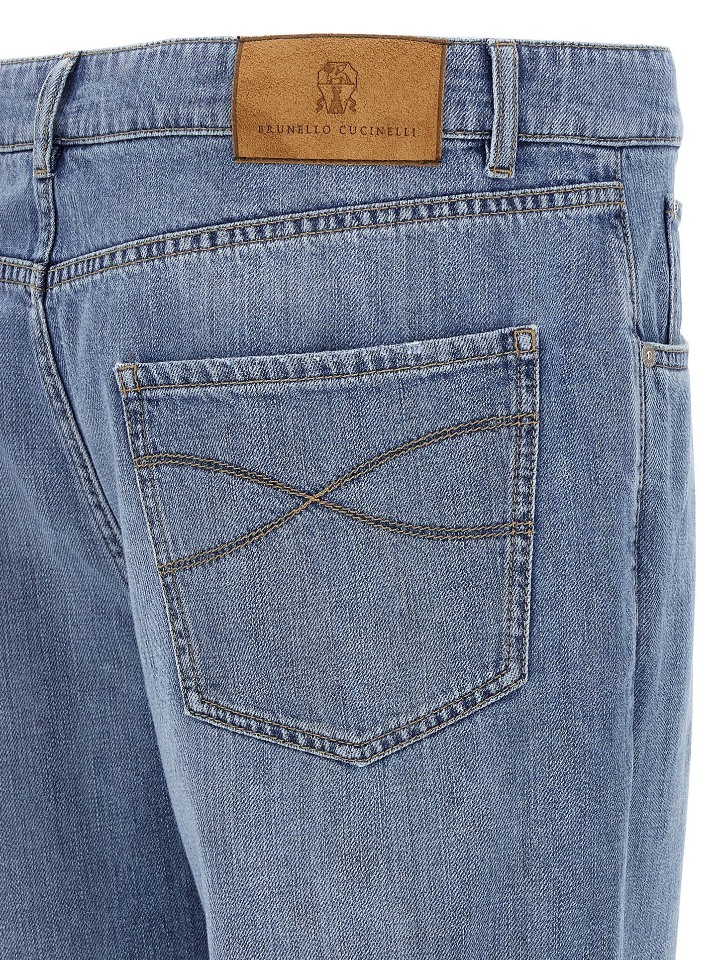 Jeans by Brunello Cucinelli for men in denim cotton & suede leather light-blue features an sartorial straight-leg and long with a cut for a sartorial finish.