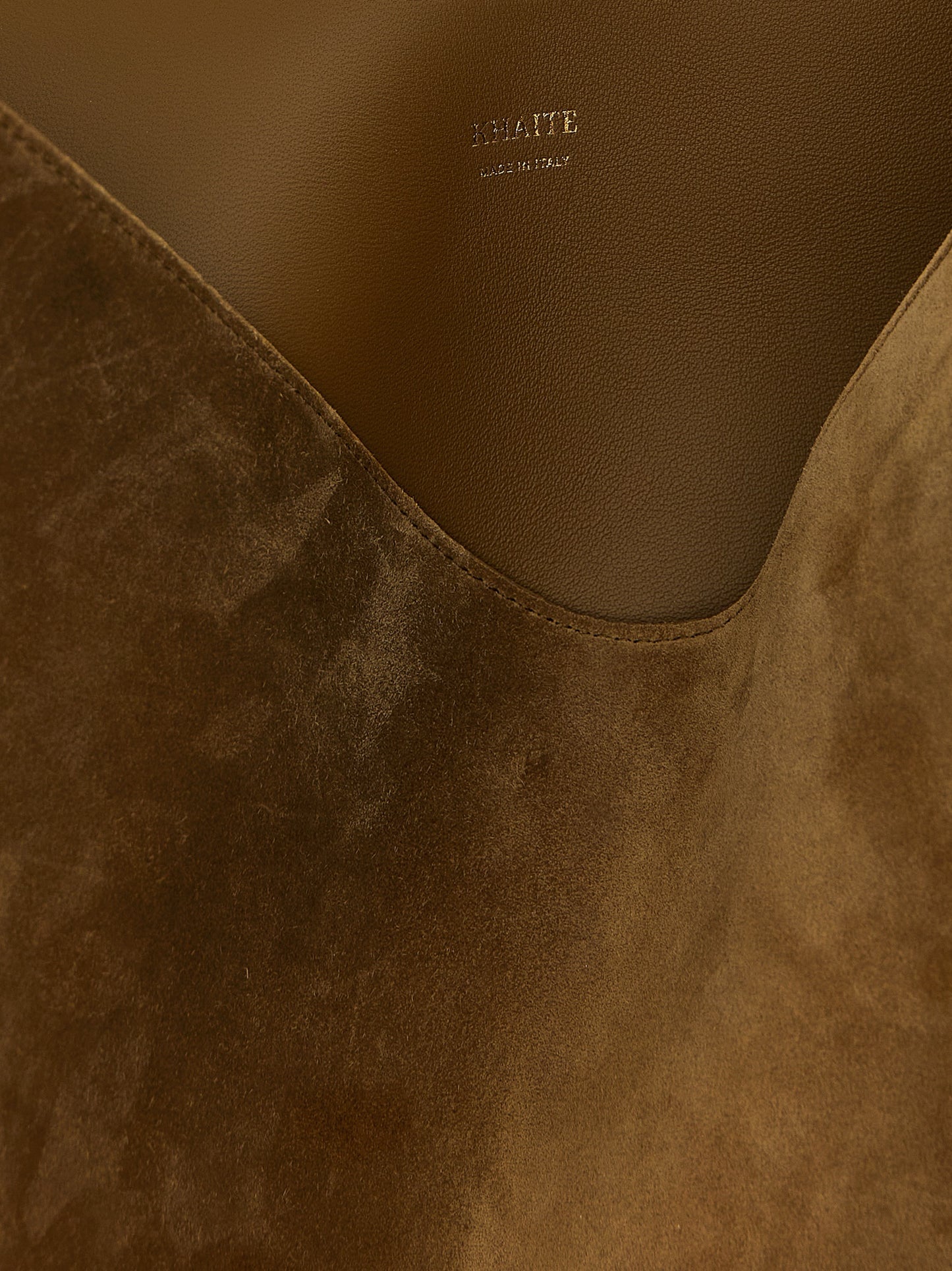 Small Shopper Tote Bag by Khaite for women in suede calfskin leather brown, gold & signature features an sumptuous Lotus Suede Calfskin Leather Small Shopper Tote Bag design with a secure flap, ample , and versatile handle for an sumptuous finish.