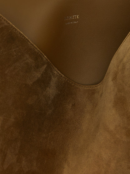 Small Shopper Tote Bag by Khaite for women in suede calfskin leather brown, gold & signature features an sumptuous Lotus Suede Calfskin Leather Small Shopper Tote Bag design with a secure flap, ample , and versatile handle for an sumptuous finish.