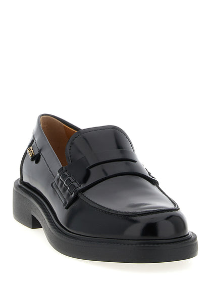 Flat Loafer Slip-On Shoes by Tod's for women in bos taurus calfskin leather gradient & black showcases a timeless silhouette from the Gommini Women's Bos Taurus Calfskin Leather Flat Loafer Slip-On Shoes collection, featuring a timeless flat and for a timeless finish.