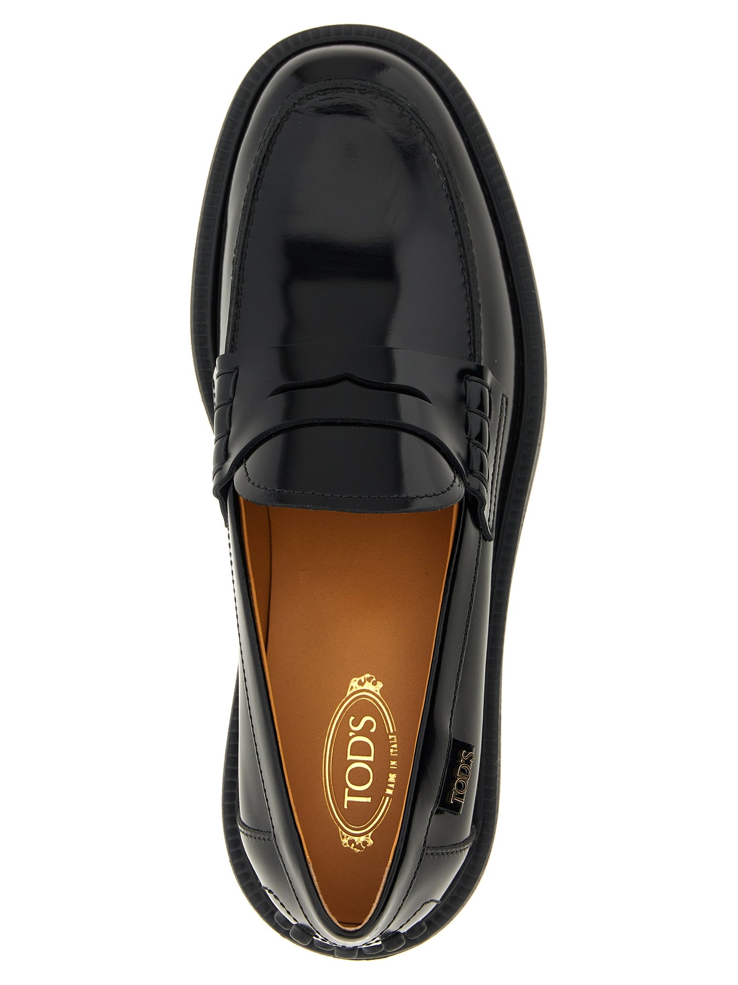 Flat Loafer Slip-On Shoes by Tod's for women in bos taurus calfskin leather gradient & black showcases a timeless silhouette from the Gommini Women's Bos Taurus Calfskin Leather Flat Loafer Slip-On Shoes collection, featuring a timeless flat and for a timeless finish.