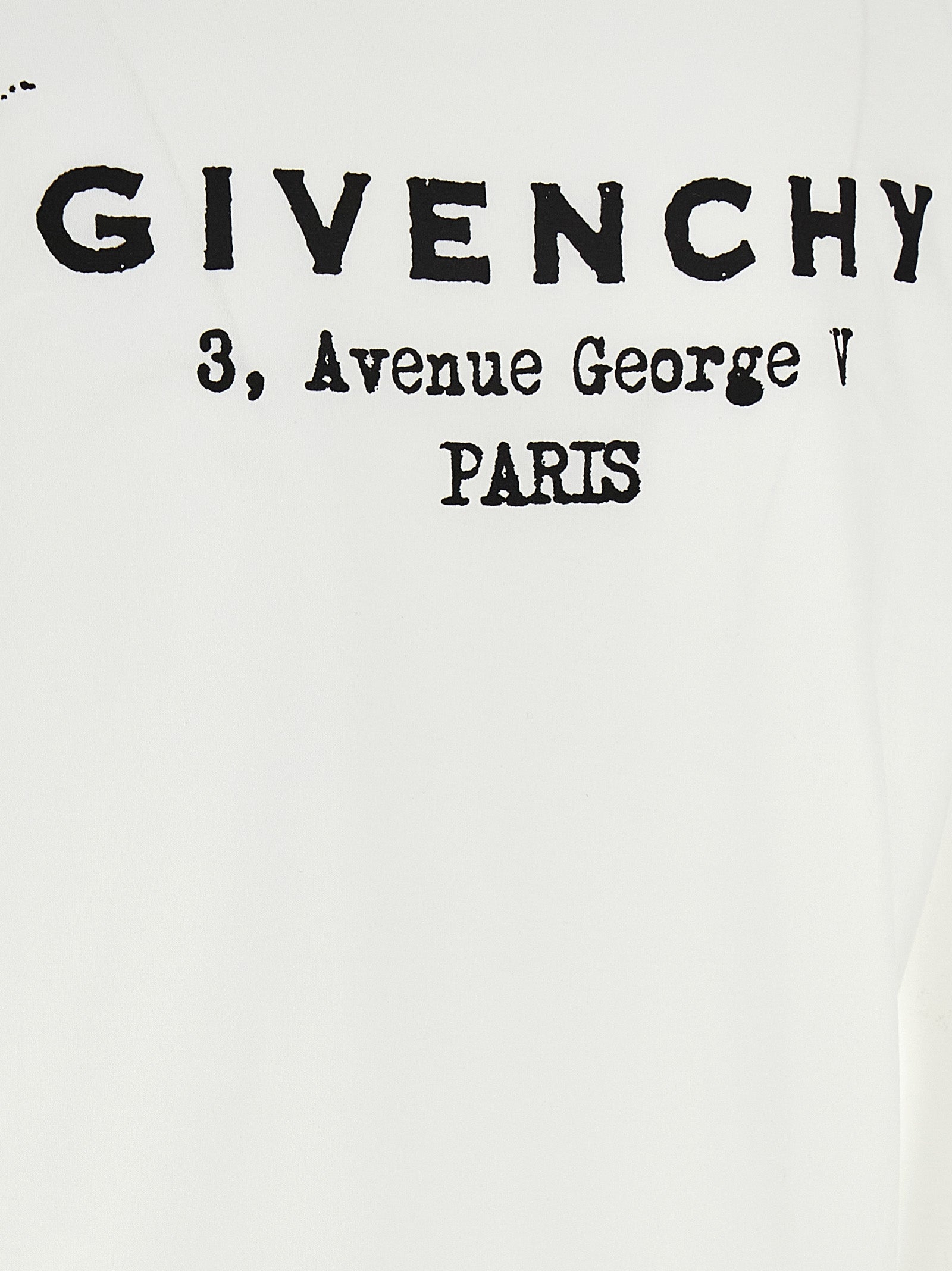 T-Shirt by Givenchy for women in cotton bicolour, black, white & print showcases a unassuming silhouette, artfully detailed with a refined and unassuming for a sophisticated, contemporary look.
