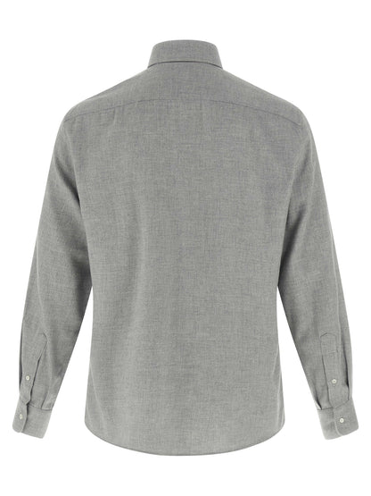 Shirt by Brunello Cucinelli for men in lyocell & cotton gray showcases a sharp silhouette, elegantly detailed with a sharp and sharp .