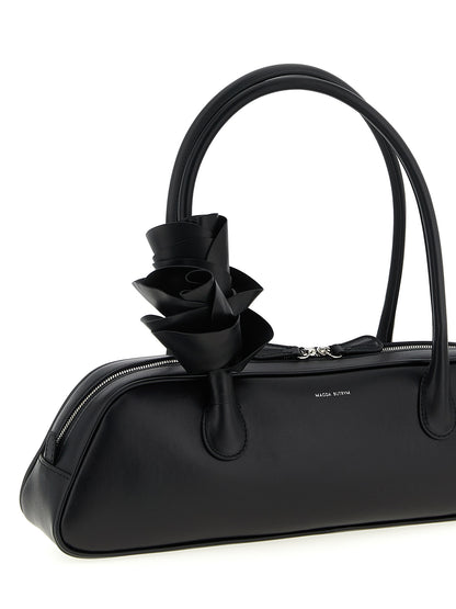 Shoulder Bag by Magda Butrym for women in calfskin leather black, rose & floral features a effortless sophistication silhouette, secured by a zipper with ample and versatile shoulder-strap & handle for a effortless sophistication finish.